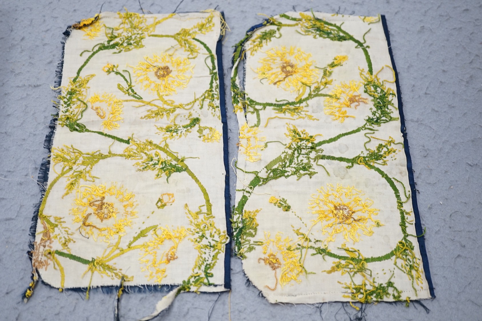 An 18th century embroidered dress front and a similar length of embroidered trimming, together with metallic thread and other later embroidered panels